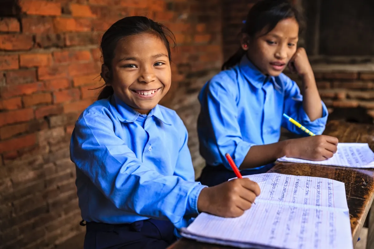 Volunteers teaching children